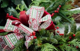 green wreath with a bow